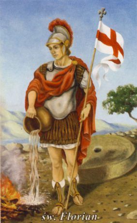 Święty Florian - obraz mężczyzny w tradycyjnym stroju żołnierza wojsk rzymskich z pierwszych wieków. Trzyma naczynie z wodą do gaszenia ognia. W drugiej ręce trzyma sztandar z czerwonym krzyżem na białym tle.